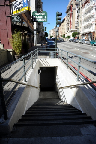 The iron-railed stairs that lead down to Stockton St.