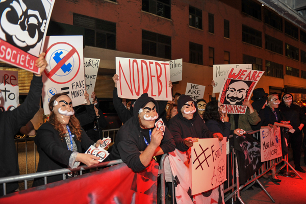 E-Coin-Launch-Exit-Protests-NYCC-2017-photo-by-Kendall-Whitehouse-600x400