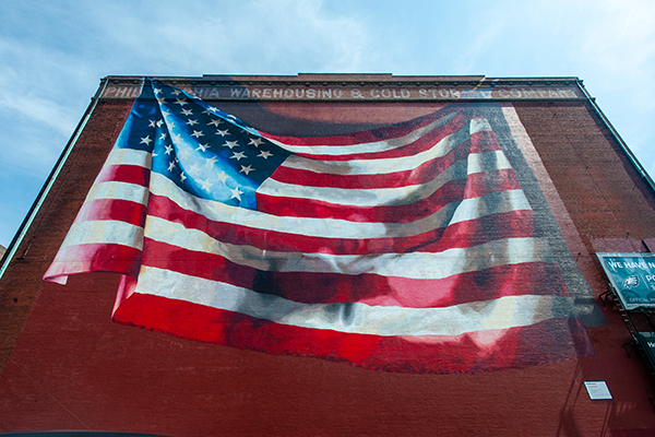 "Our Flag Unfurled" by Meg Saligman on the south side of Building B.